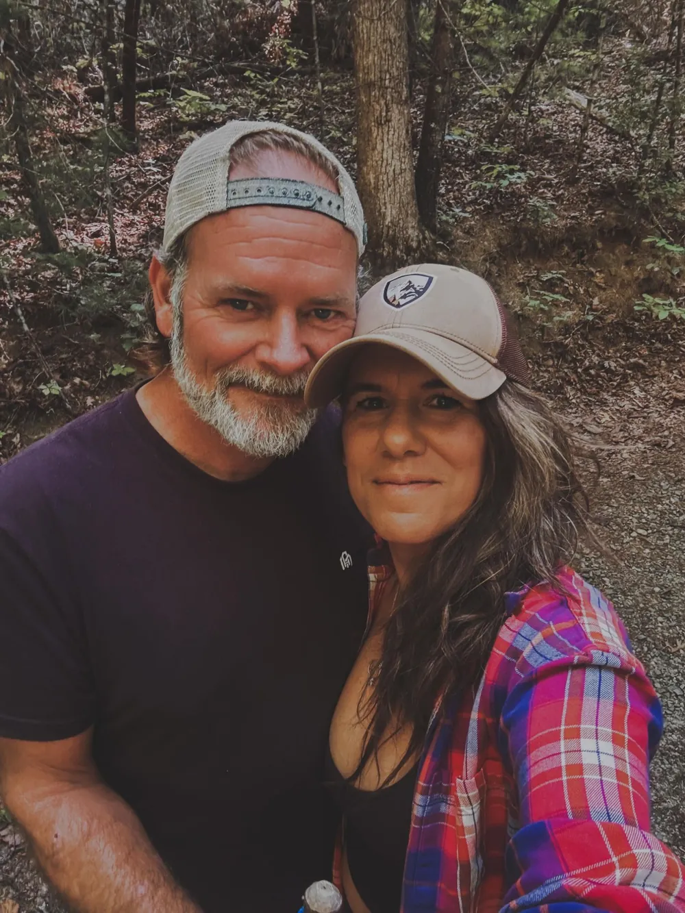 Mel and David together in the woods